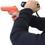 Hands in a defensive stance, holding a 6 inch Police Force Tactical L2 LED Flashlight and fake gun