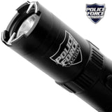 A close up view of Police Force Tactical Rechargeable Stun Gun Flashlight 9.2M highlighting its metal prongs