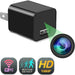 A black USB wall charger with a hidden camera lens with motion detection, HD 1080p and wifi connection