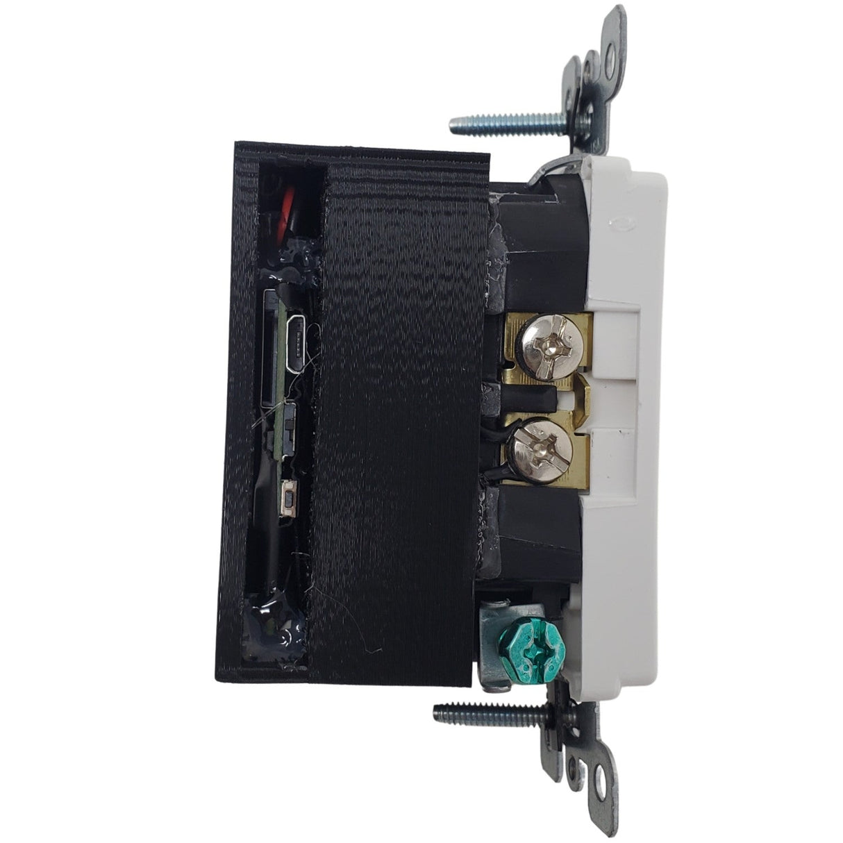 Side view of SpyWfi Working Plug Outlet Hidden Motion Detection Spy Camera 4K UHD WiFi exposing the sd card slot and usb port