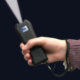 Streetwise Black Jack 120dB Stun Gun Alarm 21M with flashlight and wrist strap held in hand