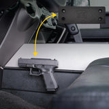 Streetwise Magnetic Gun Mount installed securely inside the car with handgun attached