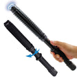 a hand holding a Streetwise™ Expandable 19" LED Stun Gun Baton 30M.