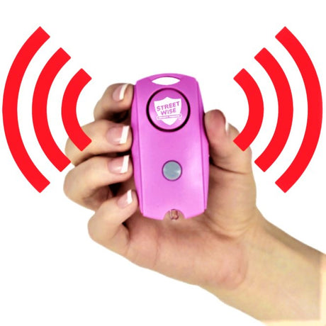 Pink Streetwise Keychain Panic Alarm blasting a 120 dB alarm