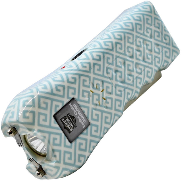 A teal and white geometric patterned Streetwise™ Ladies' Choice LED Stun Gun Alarm 21M with a squeeze-n-stun feature and an attached keychain.