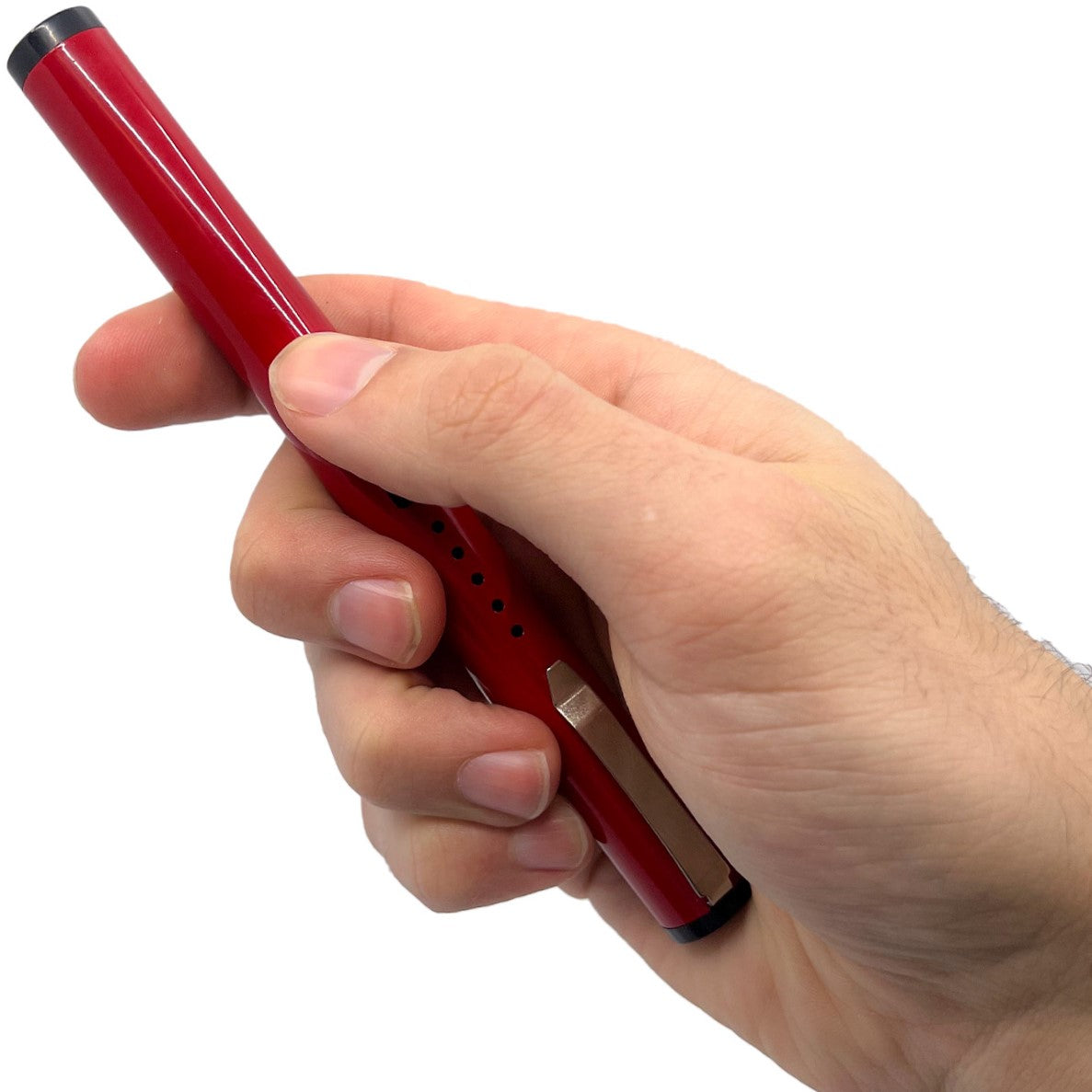 Hand holding a red streetwise pain pen