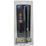 A black streetwise streetlight LED flashlight with its USB recharging cable in packaging.