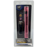 a pink streetwise streetlight LED flashlight and its USB recharging cable in packaging.