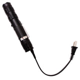 a Tiger-USA Xtreme SHOCKDROP Stun Gun Flashlight with a plug attached
