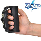 a hand gripping a ZAP Blast Knuckles Stun Gun Extreme w/ Holster 950K