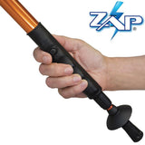 a hand holding the other end of the ZAP Hike 'n Strike™ LED Stun Gun Staff 