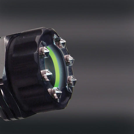 a closeup angle of the ZAP Light Rechargeable Stun Gun Flashlight, showing its metal prongs